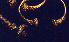 Detail -- ends of torc and two open bracelets